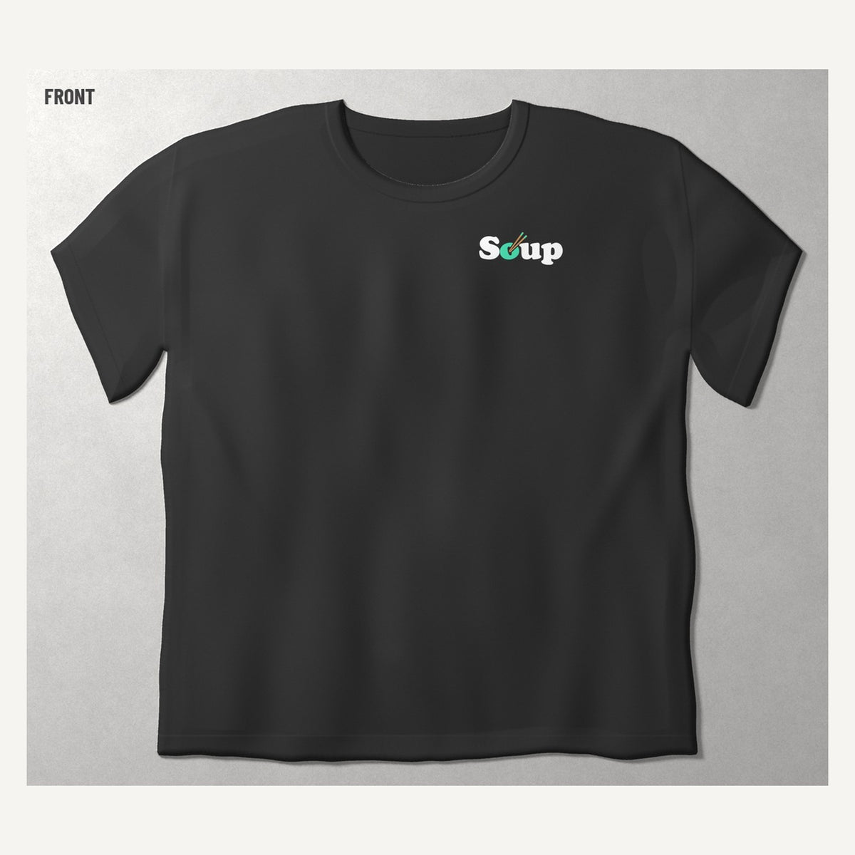 Soup Syndicate Tyre Stack Soupman tee in washed black, front view with the Soup wordmark on the chest